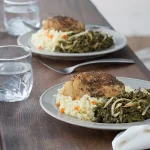 Quick Garlic Spinach Side Dish on a White Plate